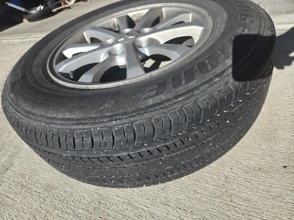 All Season Bridgestone Tire on Mitsubishi RVR Rim image indicator(2)