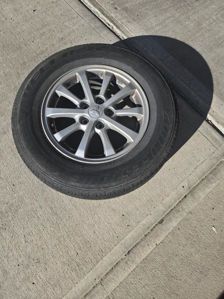 All Season Bridgestone Tire on Mitsubishi RVR Rim image indicator(4)