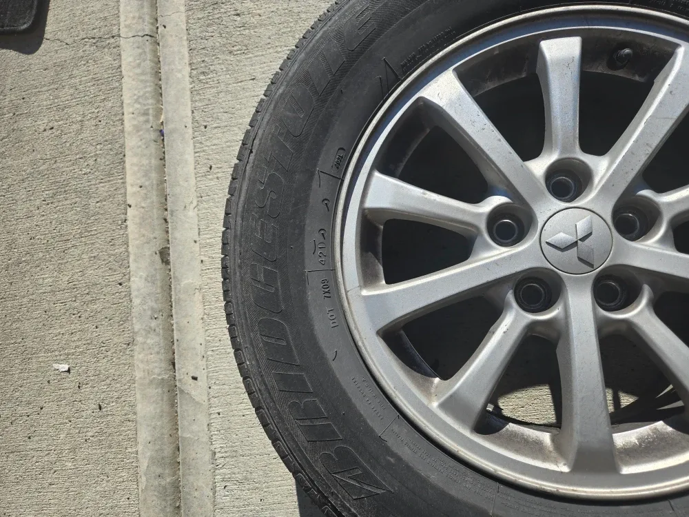 All Season Bridgestone Tire on Mitsubishi RVR Rim image indicator(5)