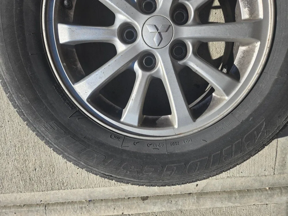 All Season Bridgestone Tire on Mitsubishi RVR Rim image indicator(6)