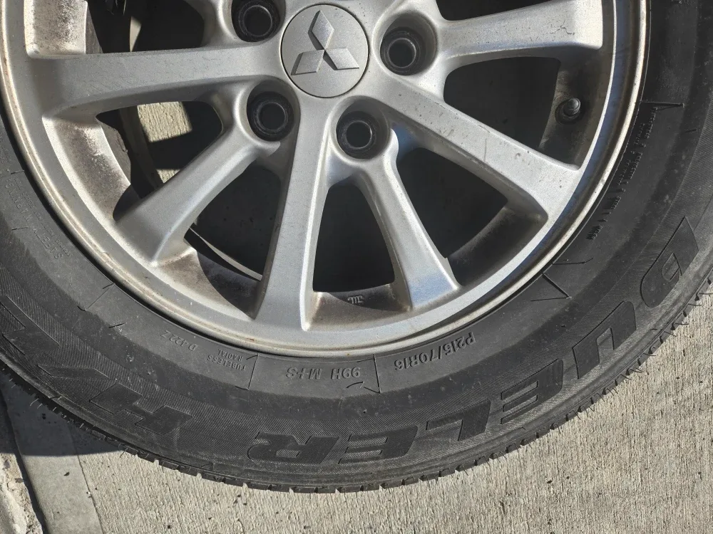 All Season Bridgestone Tire on Mitsubishi RVR Rim image indicator(7)