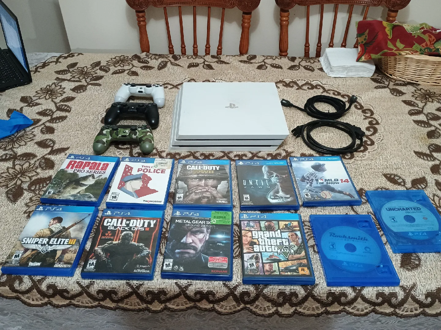 PlayStation 4 pro 1TB with 3 controllers + 11 games image indicator(7)