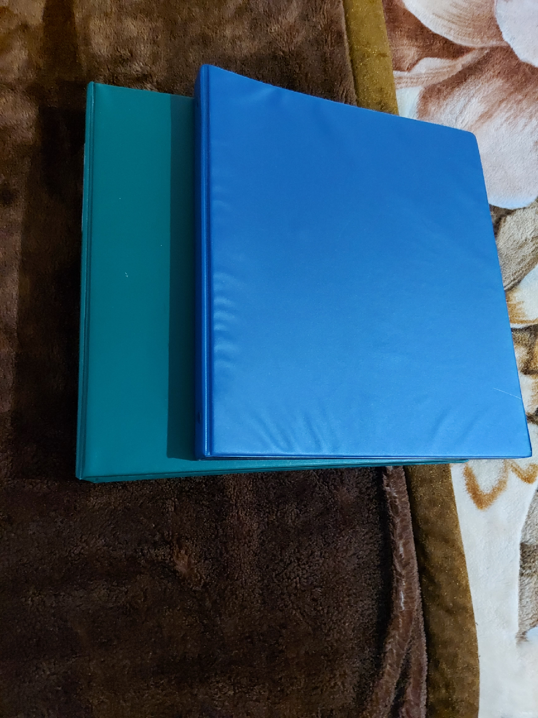 Two binders (blue & green)
