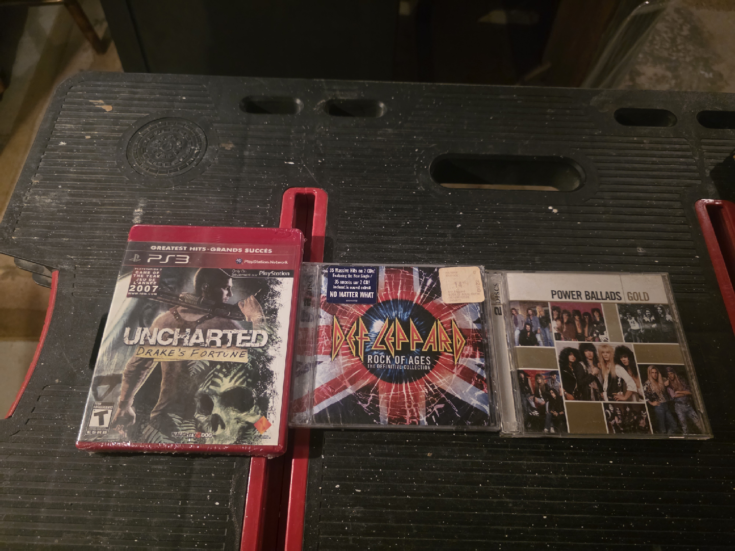 CDs: Def Leppard, Uncharted, Power Ballads