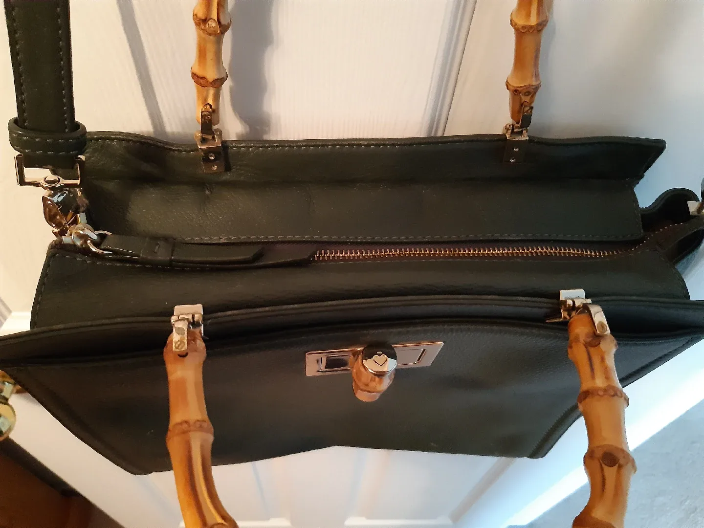 green Kate Spade Purse with bamboo handles image indicator(3)