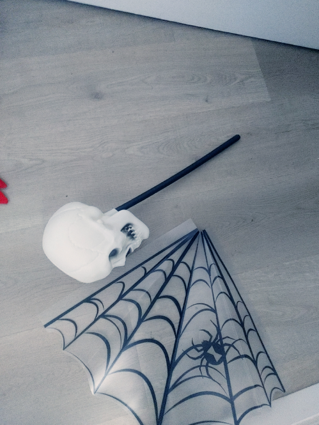 Halloween Plastic Skull on stick and corn web decor