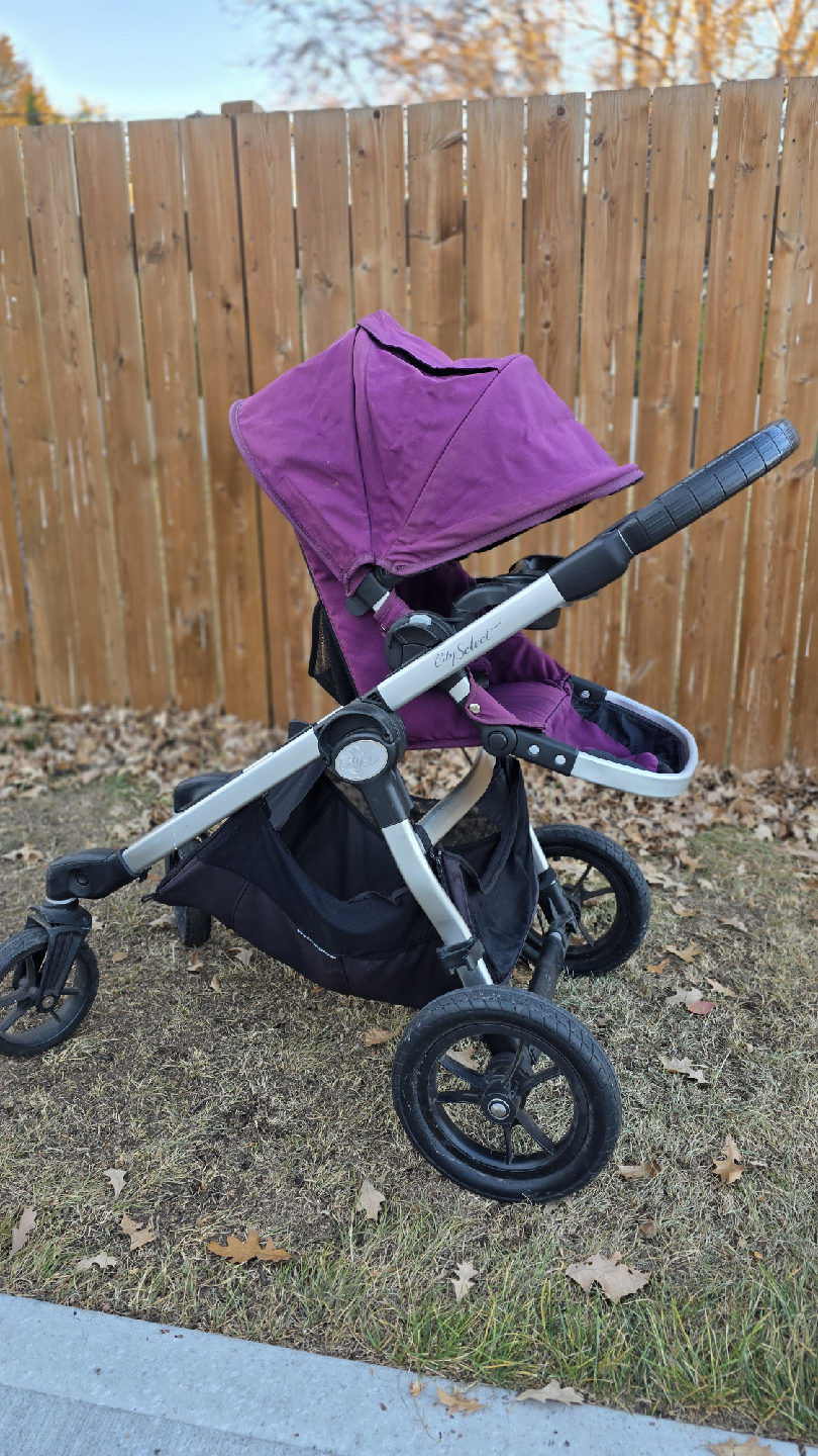 Purple stroller in good condition