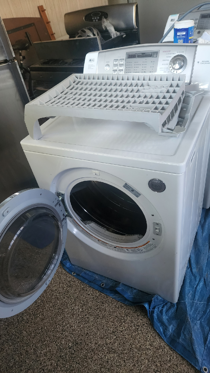 LG White Front Load Washer & dryer.