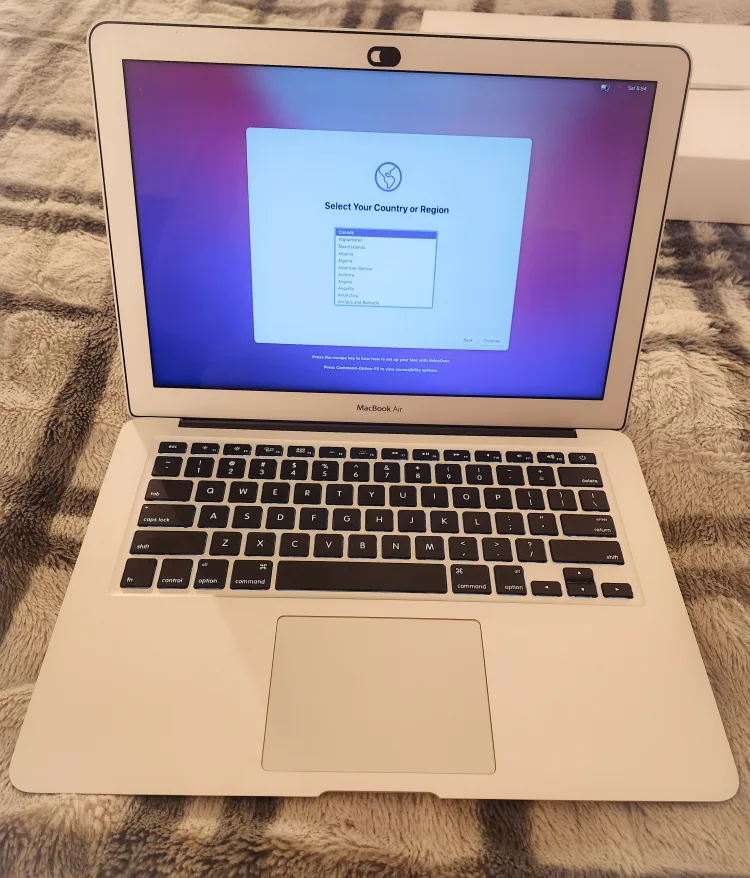 MacBook Air with laptop bag and accessories thumbnail