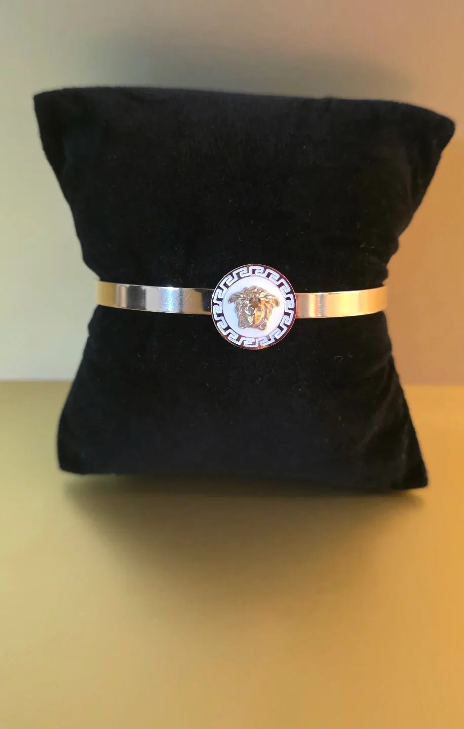 V. Gold Tone Medusa Bangle Bracelet