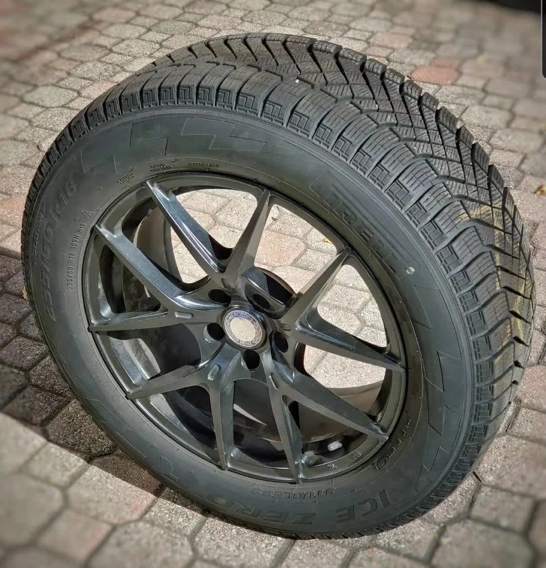 Set of Pirelli Ice Zero Studded 235/60R18 Winter Tire & Wheels