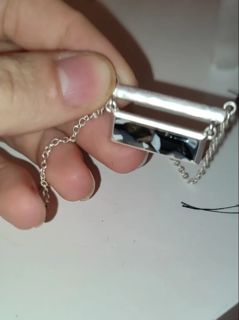 Silver Tone Necklace with Black & White pendant image indicator(3)