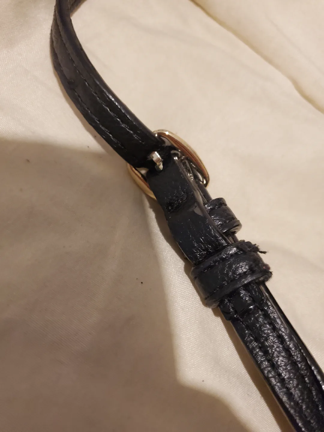 Victorias Secret black mini backpack with gold-like chain accent image indicator(6)