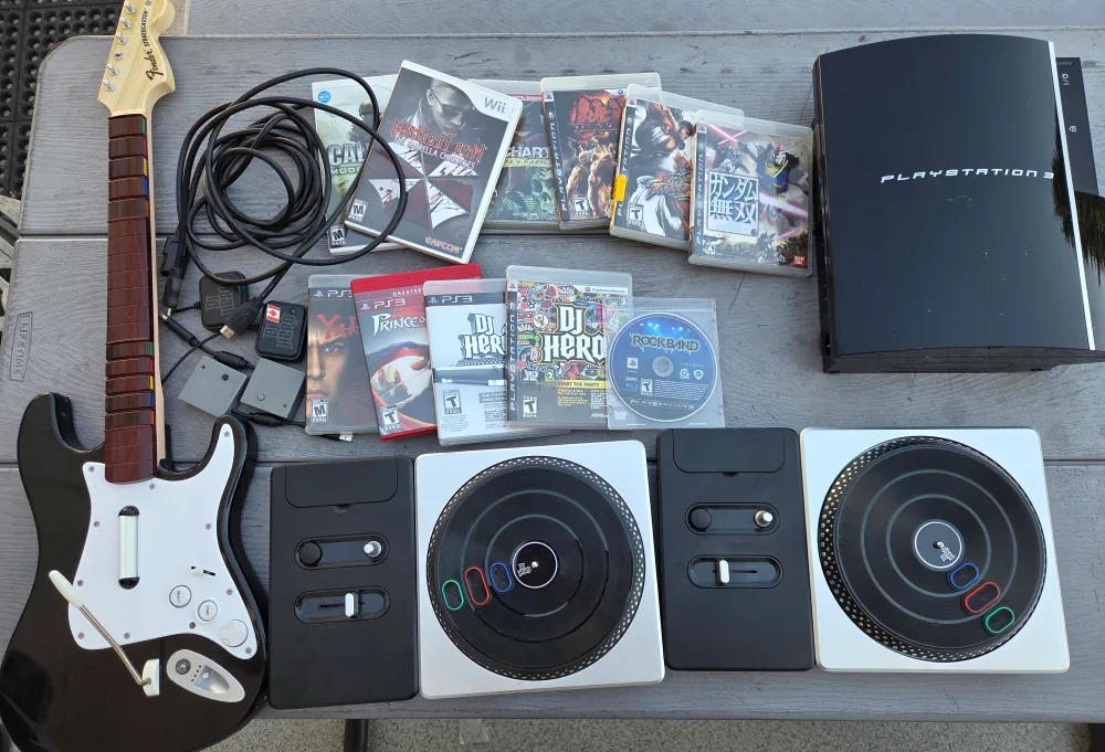 PlayStation 3 Console with Games and Accessories thumbnail