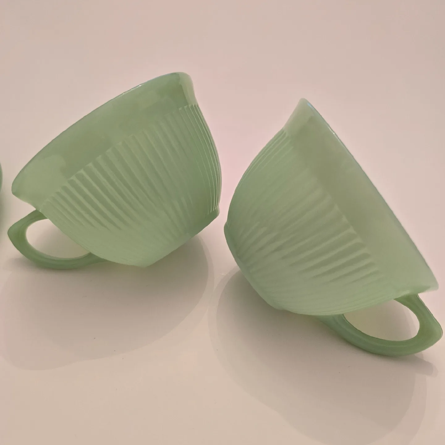 Set of 2 Fireking Jadeite Teacups and Saucers image indicator(7)
