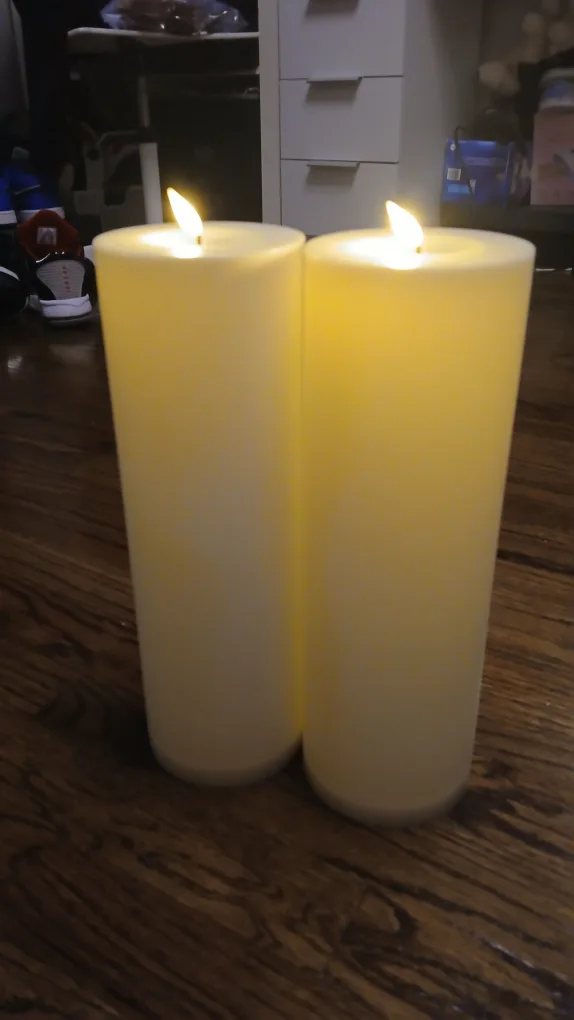Two White Flameless Candles image indicator(2)