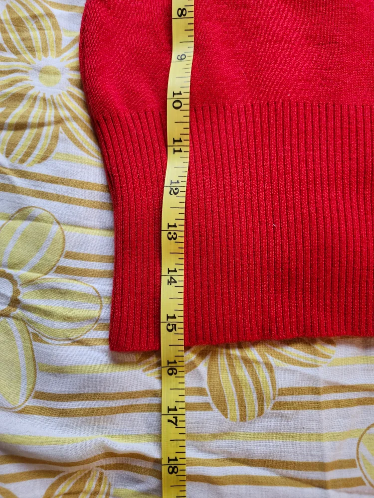 Red and black Bum Warmer mini sweater skirt with flower detail image indicator(8)