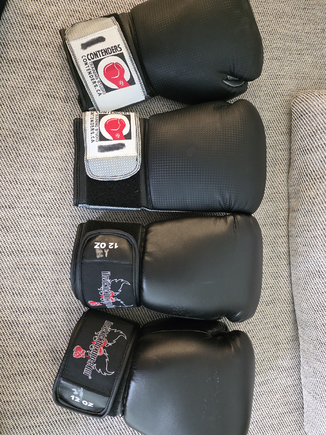 Two pairs of boxing gloves