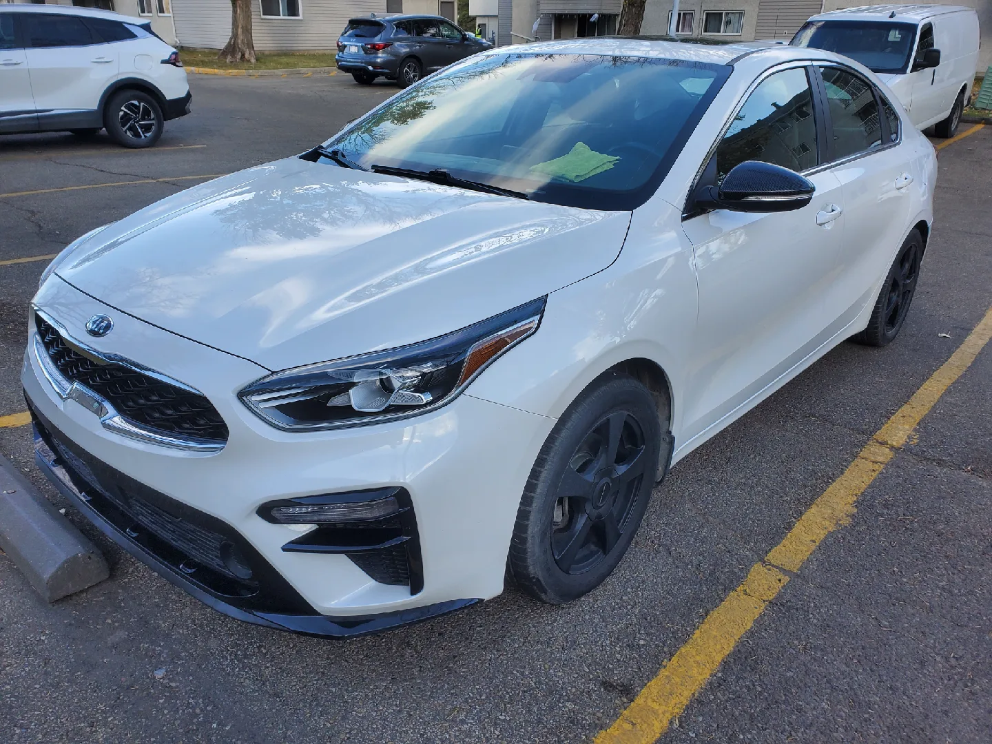Kia Forte EX - White Sedan