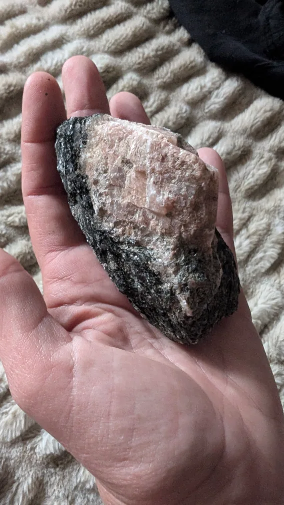 Large raw black tourmaline with pink feldspar and pink quartz. image indicator(2)