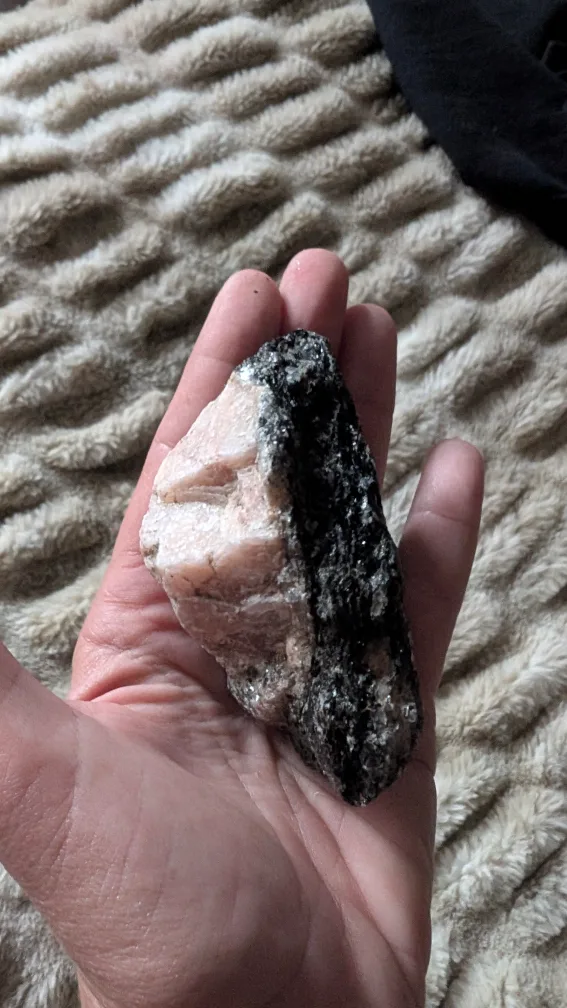 Large raw black tourmaline with pink feldspar and pink quartz. image indicator(4)