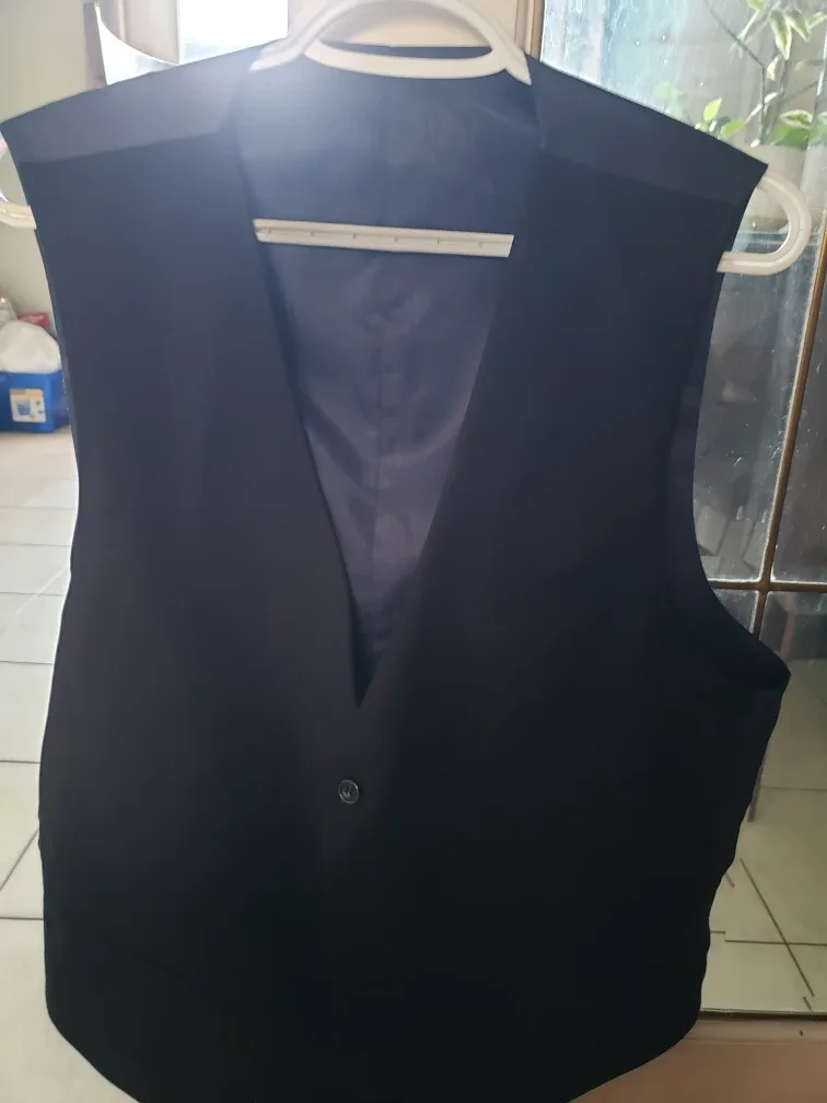 Navy blue pattern blazer with matching vest image indicator(4)