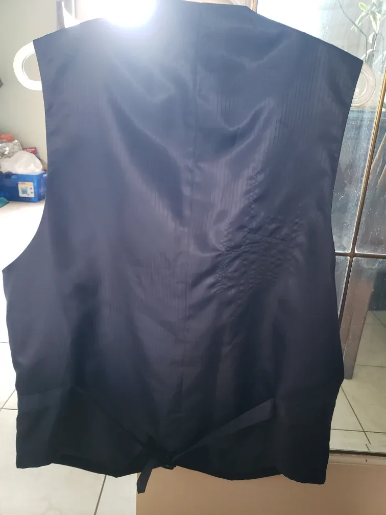 Navy blue pattern blazer with matching vest image indicator(5)