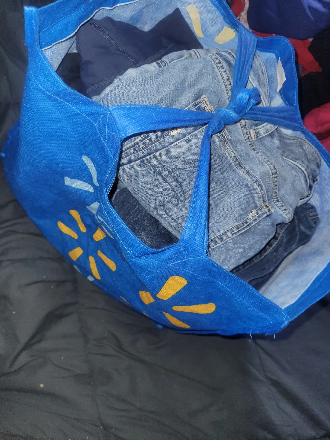 medium sized walmart bag of random clothes