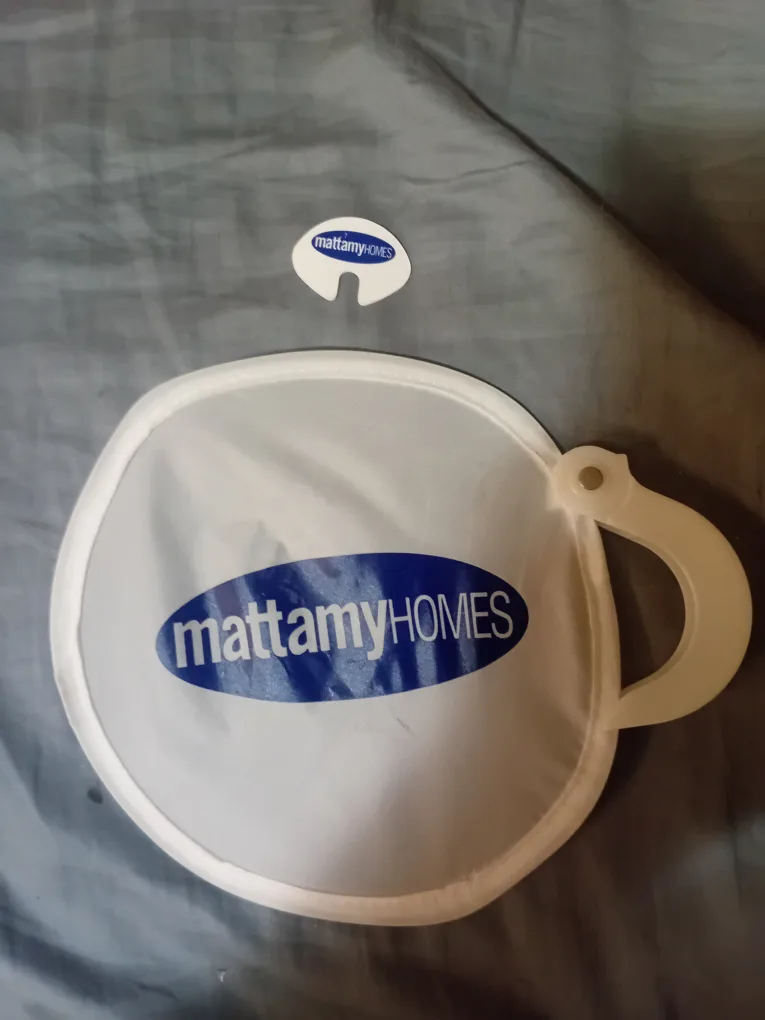 Mattamy Homes Cup-Shaped Fan and poo or beer can lid thumbnail