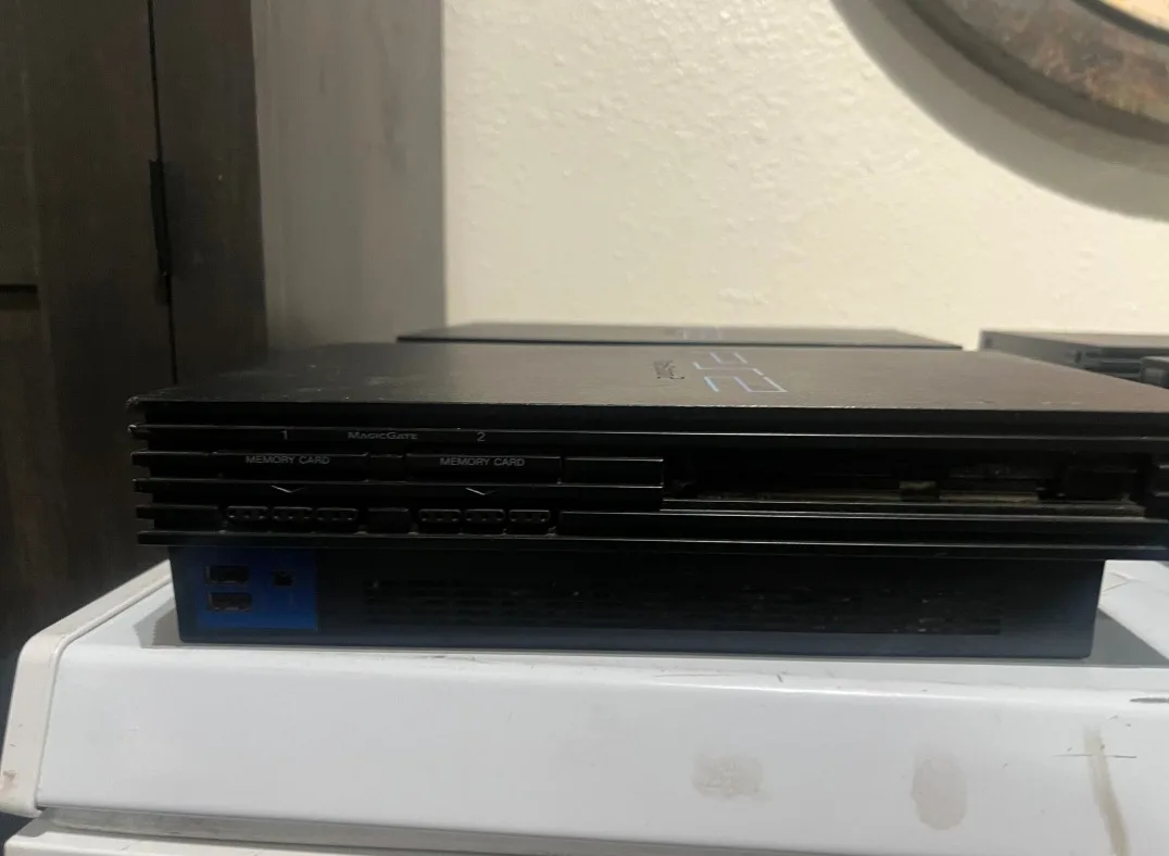 Sony PlayStation 2 with Games and Controllers