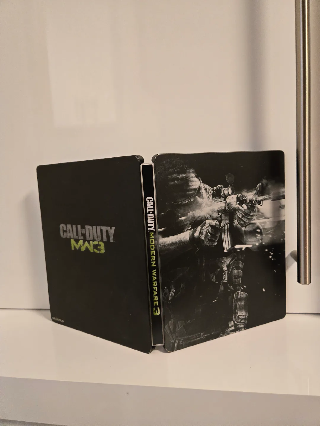 PS3 COD Steelbooks. with games. mw2 mw3 black ops Shipping. image indicator(4)