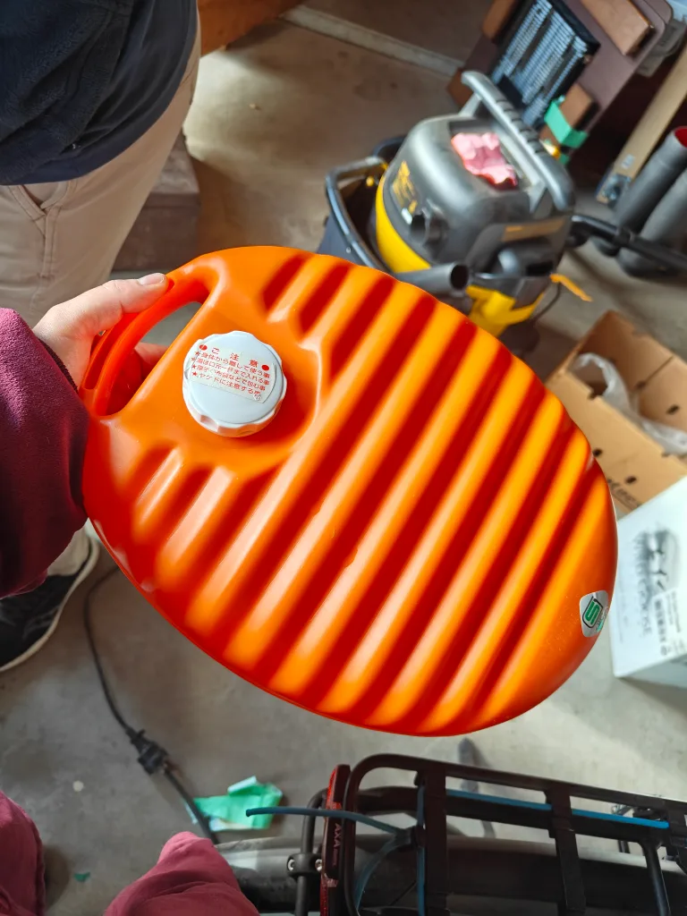 Orange Hot Water Bottle with Handle thumbnail