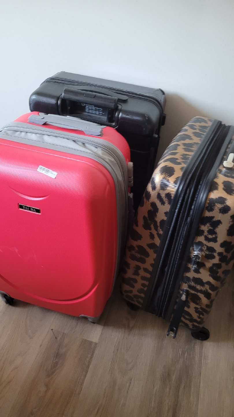 Three Used Suitcases 23 km