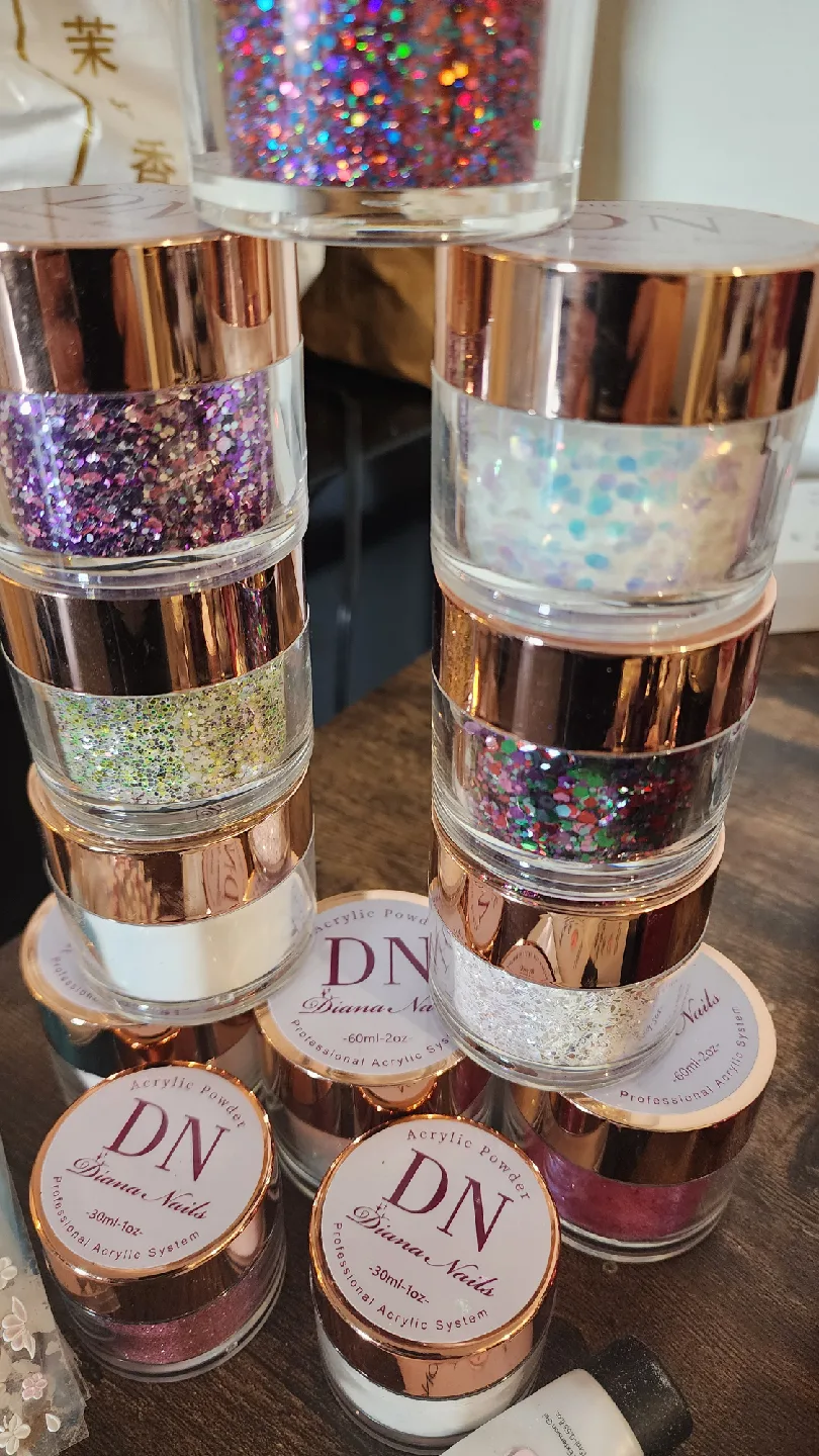 Variety of Nail Art Supplies: Powders, Gels, Glitters image indicator(6)