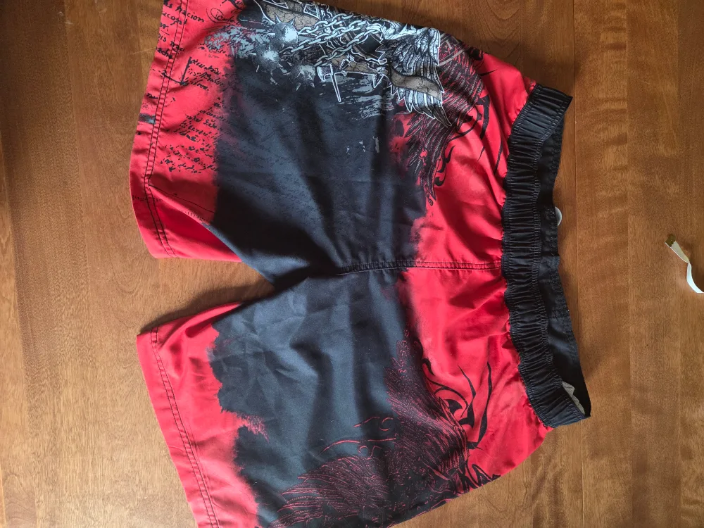 Red & Black Graphic Board Shorts, Size 32 image indicator(3)