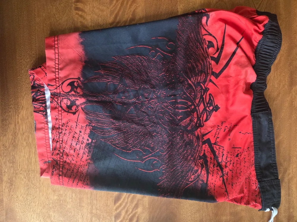 Red & Black Graphic Board Shorts, Size 32 image indicator(4)