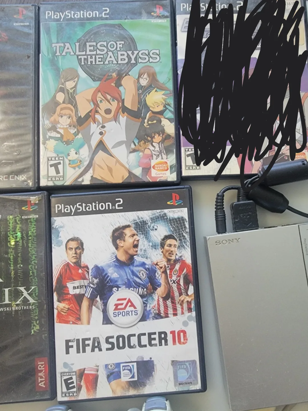 PlayStation 2 console + 7 games image indicator(8)