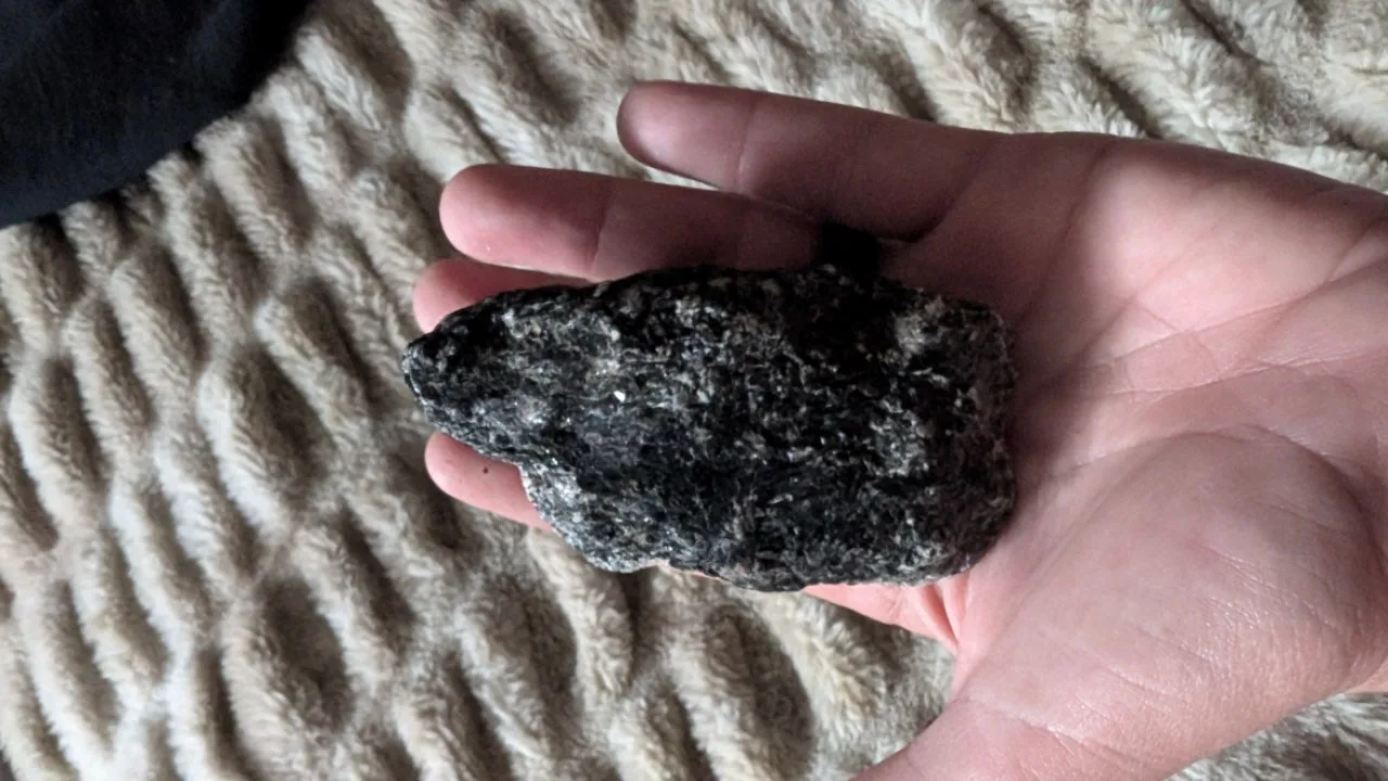Large raw black tourmaline with pink feldspar and pink quartz. image indicator(5)