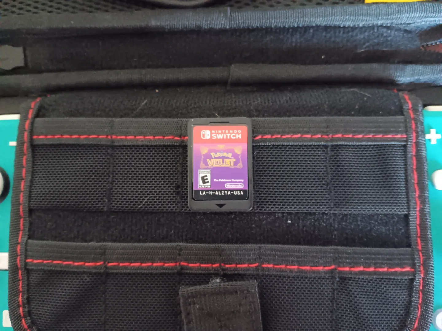 Nintendo Switch Lite Turquoise Bundle image indicator(2)