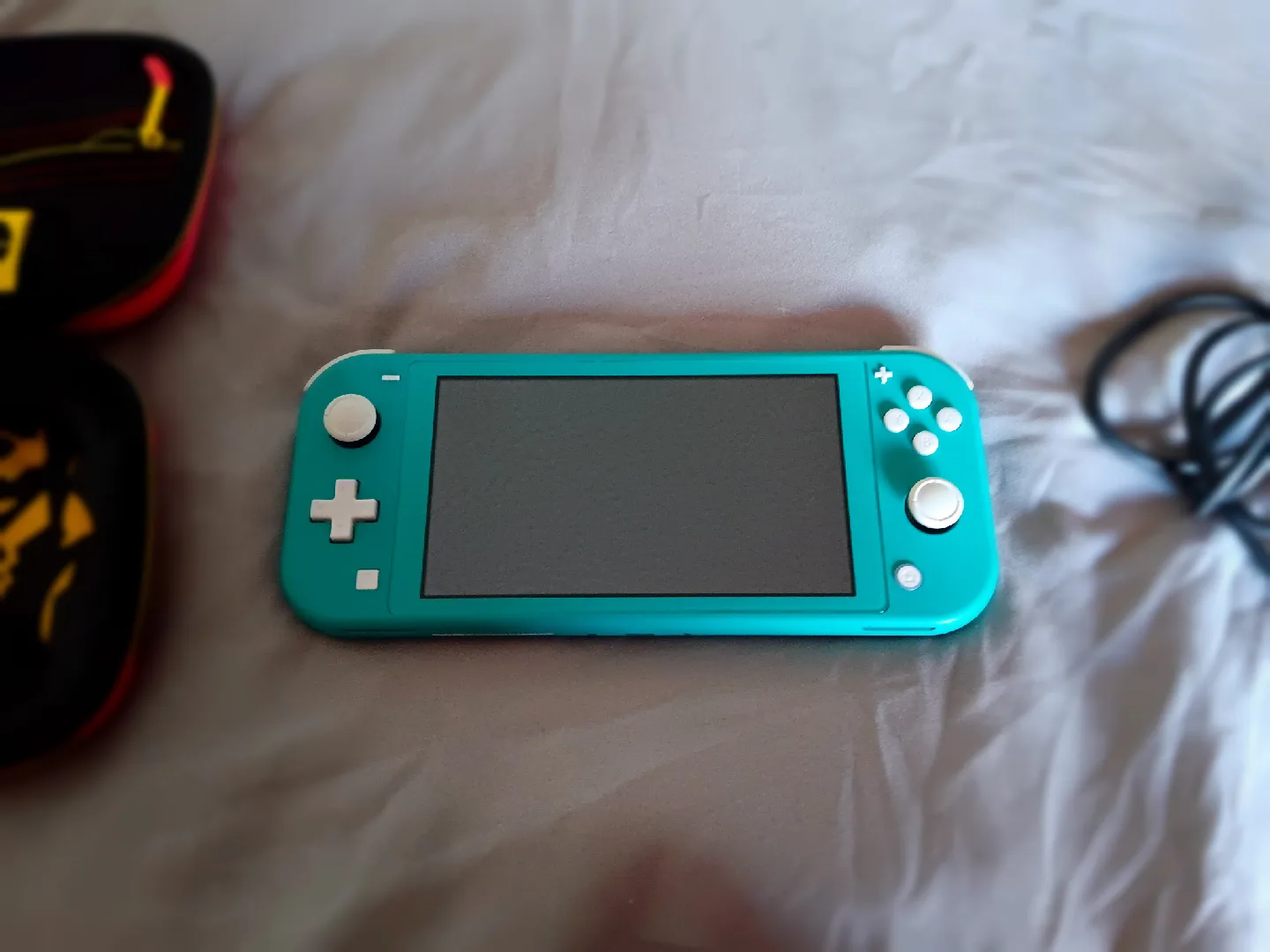 Nintendo Switch Lite Turquoise Bundle image indicator(4)