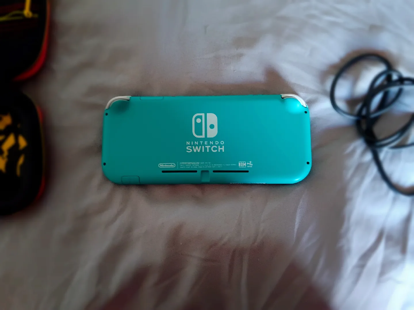 Nintendo Switch Lite Turquoise Bundle image indicator(5)