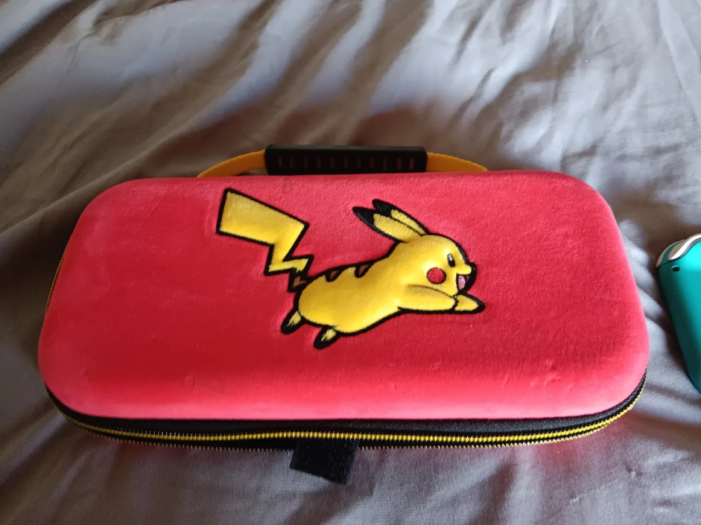 Nintendo Switch Lite Turquoise Bundle image indicator(7)