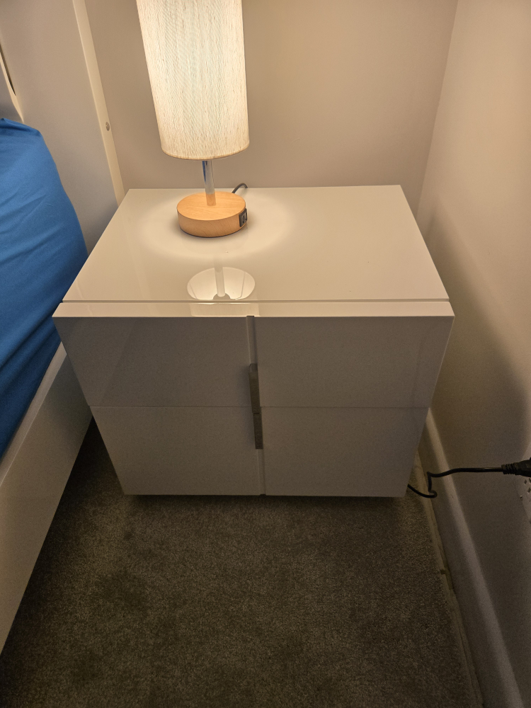 White bedside table with two drawers