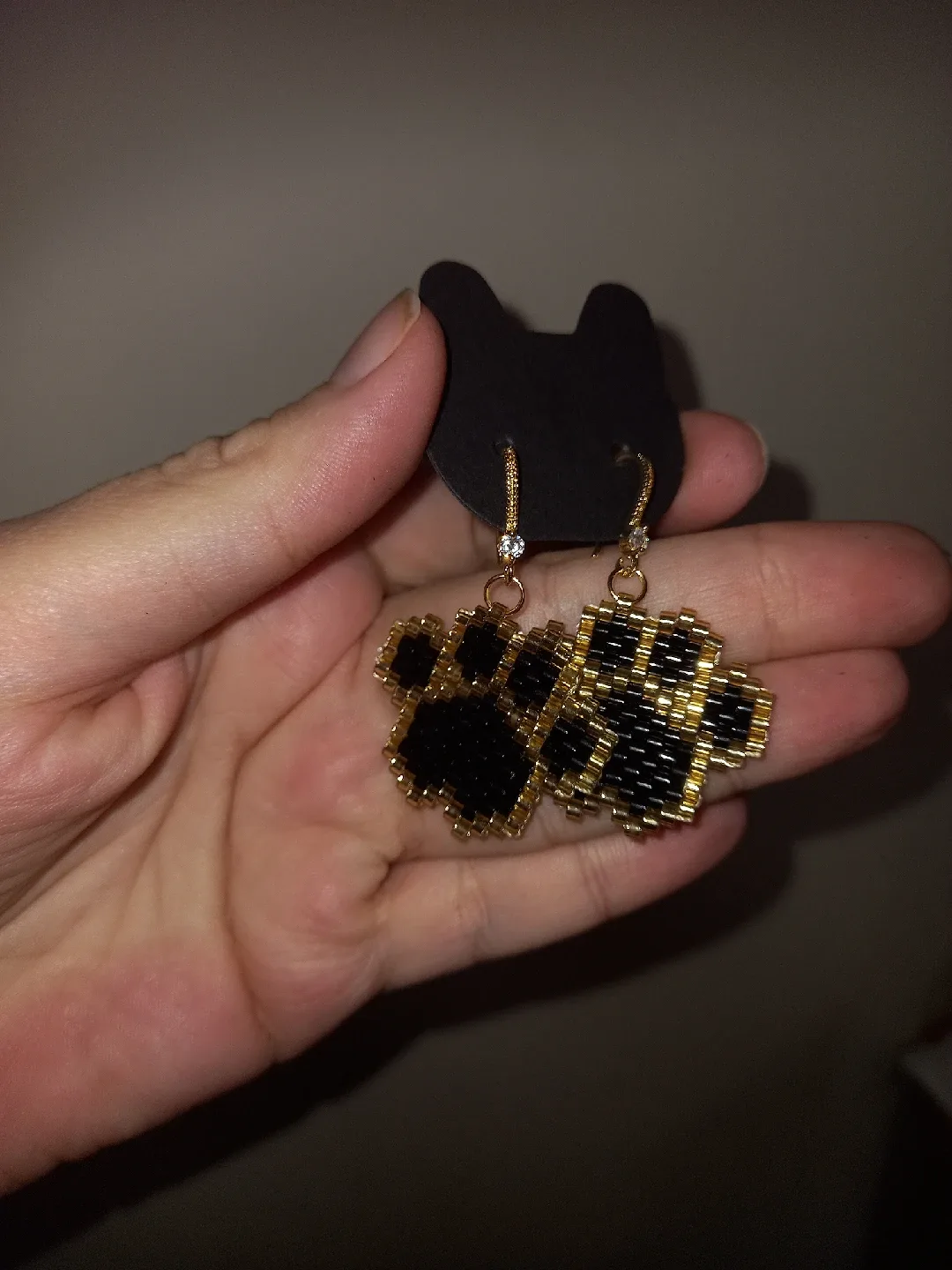 Handmade Beaded Paw Print Earrings image indicator(3)