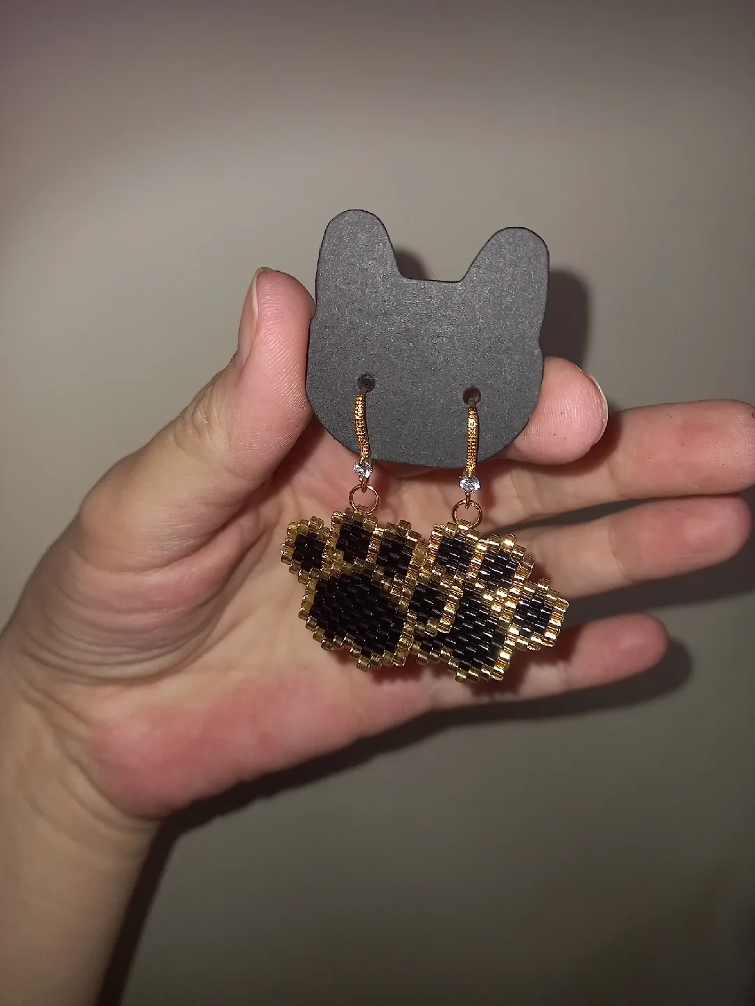 Handmade Beaded Paw Print Earrings image indicator(4)