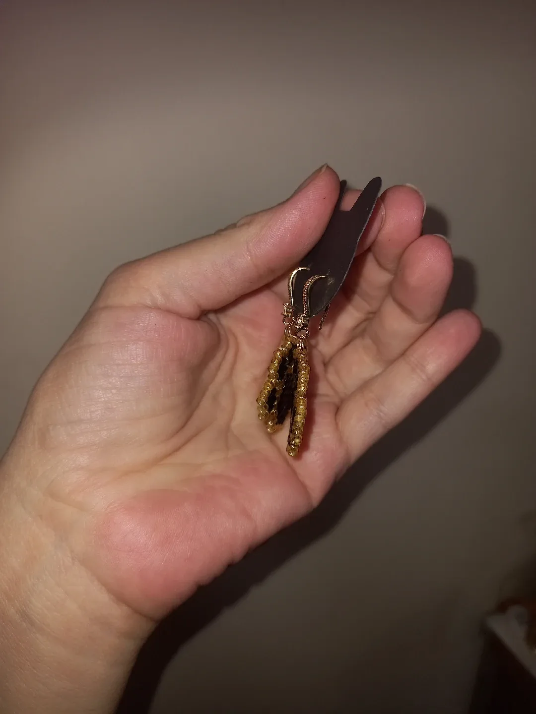 Handmade Beaded Paw Print Earrings image indicator(5)