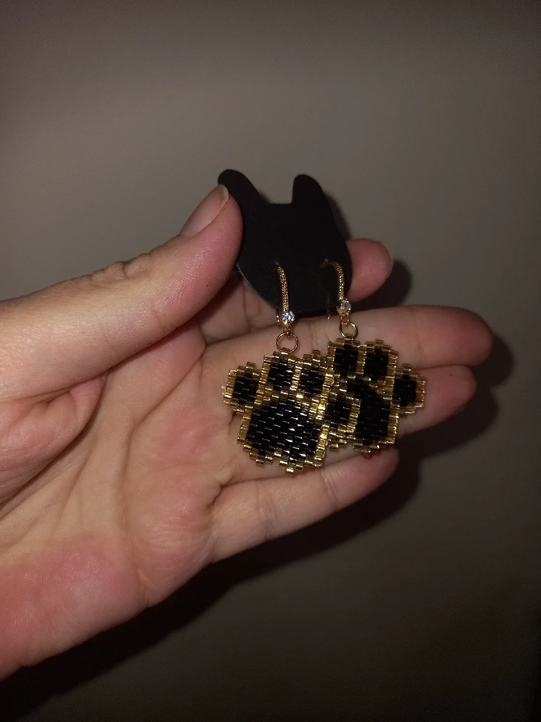 Handmade Beaded Paw Print Earrings image indicator(6)