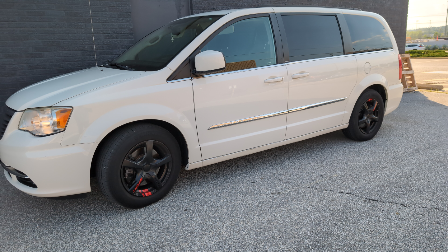 White Chrysler Town & Country Minivan - photo 3