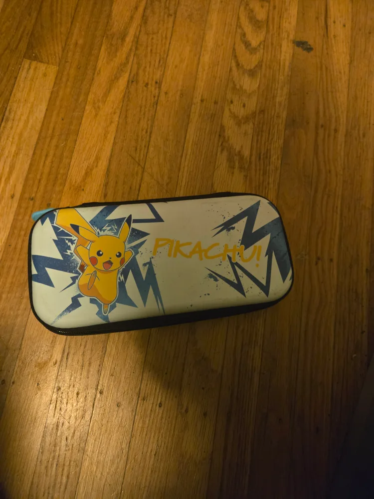 Nintendo Switch with Pikachu Case, game & RC Loader image indicator(2)