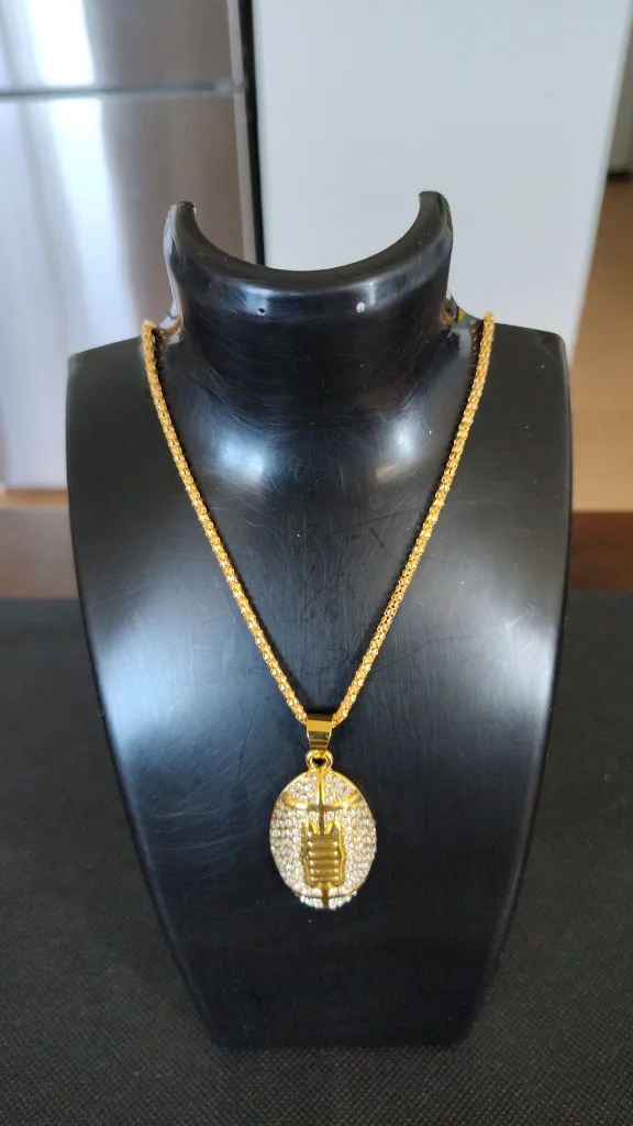 Gold Football Pendant Necklace thumbnail